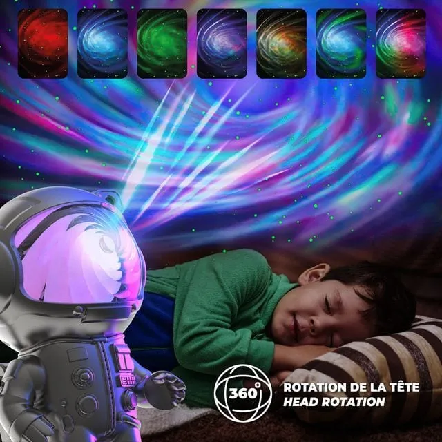 Mob Stellar Light projetant une galaxie colorée au-dessus d'un enfant couché